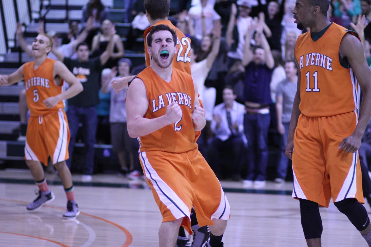 Senior Jake Vieth and teammates celebrate a comeback win over the Kingsmen