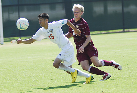 Bryan Mejia (15) dishes his second assist of the season in a 4-1 loss (Kelly Rivas photo)