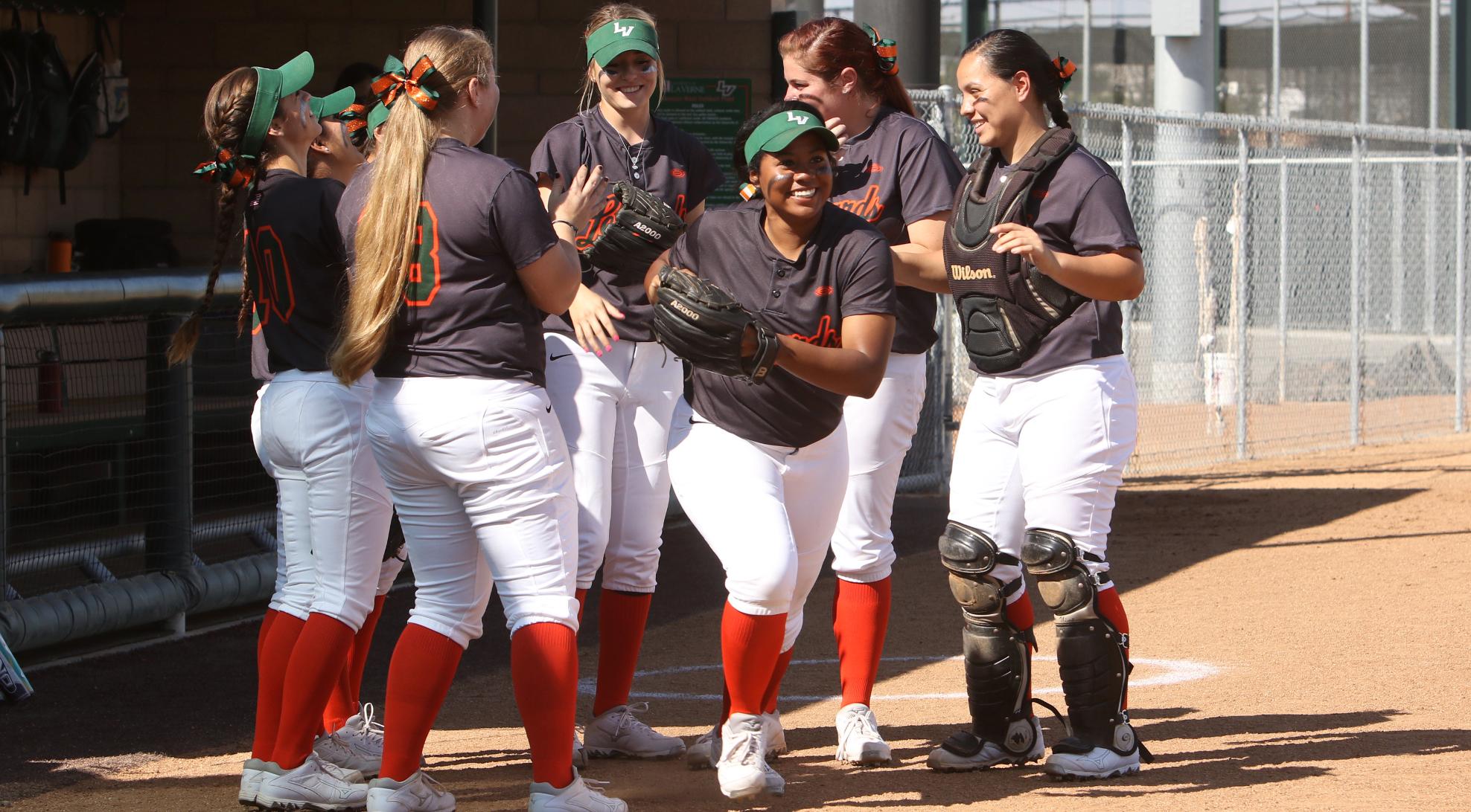 Softball splits at CMS