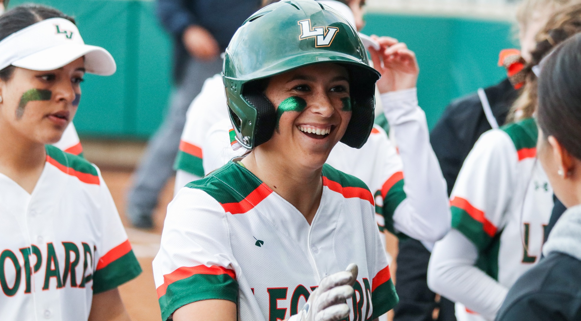 Softball launches five homers, splits doubleheader with George Fox