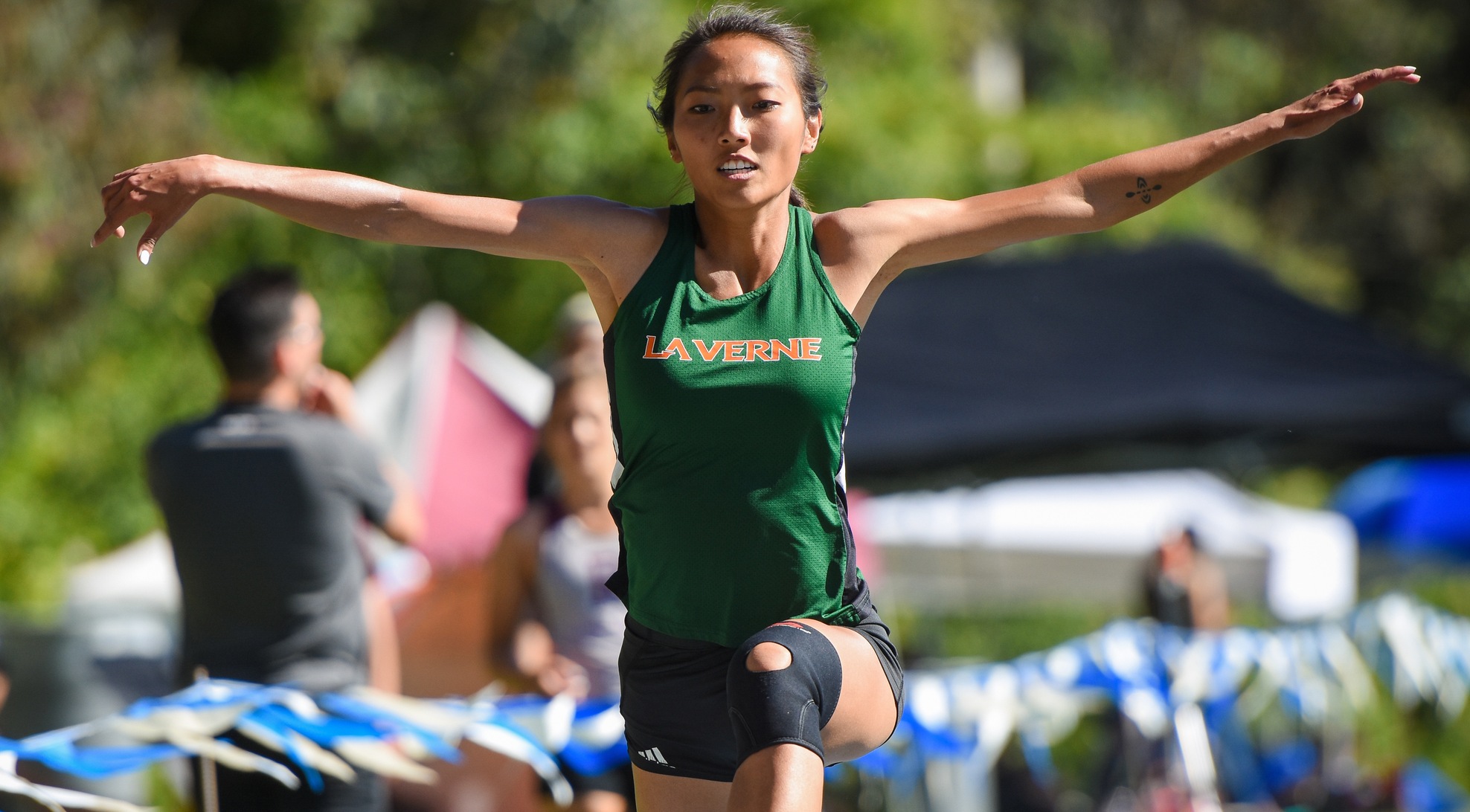Lee Kim wins triple jump, Women's Track & Field finishes fifth